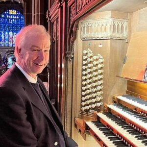 shows Graham Eccles, Chester Music Society's accompanist playing the Chester Cathedral organ
