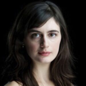 Shows Sophia Rosa, violinist with the Pixels Piano Trio playing at St Marys Centre