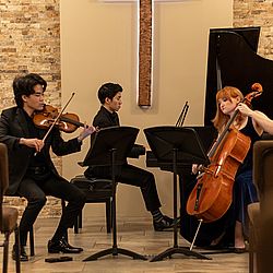this shows pianist, Ariel Lanyi, Violinist, Charlie Lovell-Jones and cellist Yoanna Prodanova